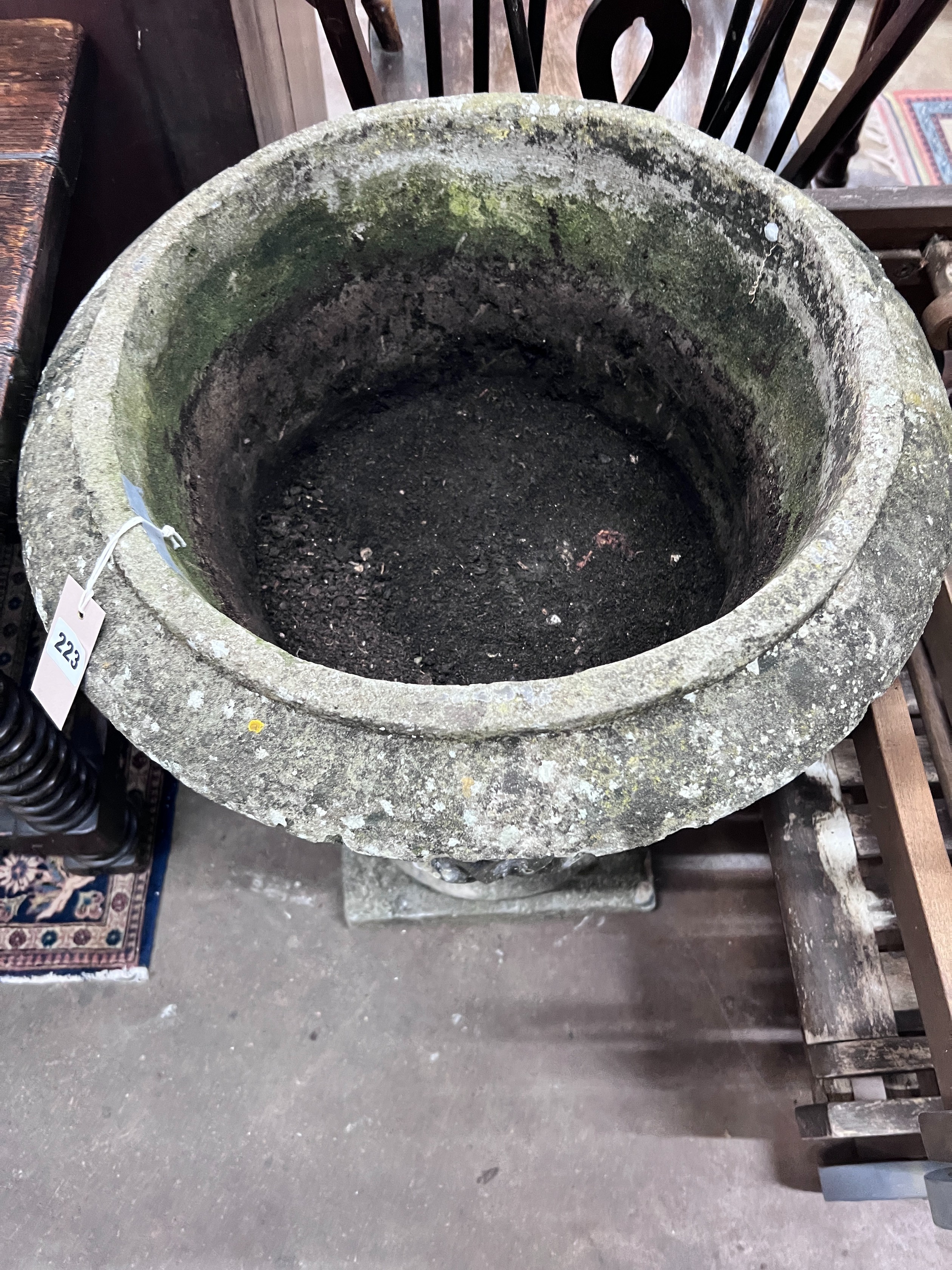 A reconstituted stone garden urn, height 70cm *Please note the sale commences at 9am.